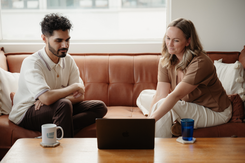 Therapists discussing HIPAA-compliant notes